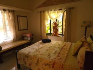 Bella Homestay Kerala客房内的一张或多张床位