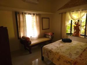 Bella Homestay Kerala客房内的一张或多张床位