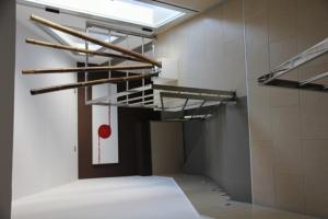Hostal Central emeletes ágyai egy szobában