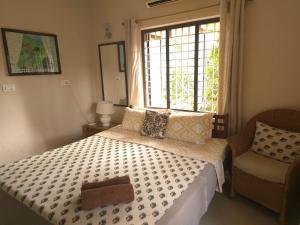 Bella Homestay Kerala客房内的一张或多张床位