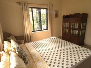 Bella Homestay Kerala客房内的一张或多张床位