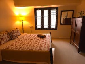 Bella Homestay Kerala客房内的一张或多张床位