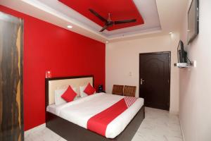 Katil atau katil-katil dalam bilik di Hotel O Raj Palace