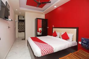 Katil atau katil-katil dalam bilik di Hotel O Raj Palace