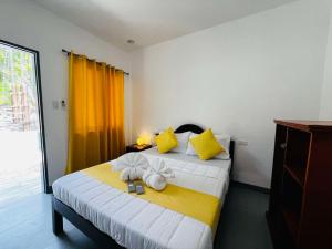Postel nebo postele na pokoji v ubytování Sebastian Guest House