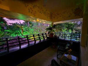Bella Homestay Kerala的阳台或露台