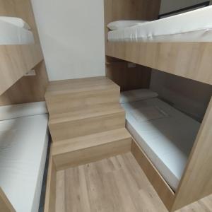 dpaso Urban Hostel客房内的一张或多张床位