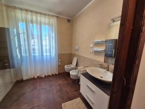 Koupelna v ubytování Casa Vacanza Ex Pretura Vallelaghi