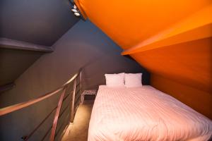 Letto o letti in una camera di Hotel Moon