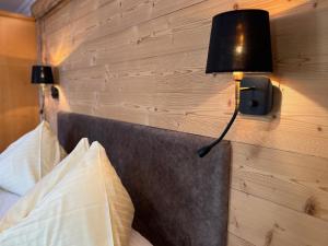Postel nebo postele na pokoji v ubytování Haus Alpenglühn