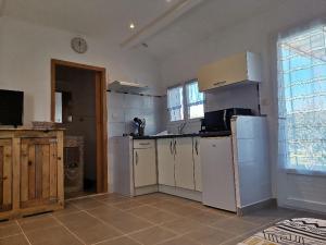 Køkken eller tekøkken på Les Lauriers + 1 billede