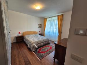 Postel nebo postele na pokoji v ubytování Casa Vacanza Ex Pretura Vallelaghi