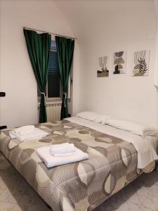 A bed or beds in a room at Il Cortile