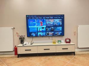 TV/Unterhaltungsangebot in der Unterkunft 福来小院民宿