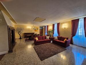 Posezení v ubytování Casa Vacanza Ex Pretura Vallelaghi