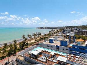 an aerial view of the beach and buildings at Setai Yacht by DayByDay in João Pessoa