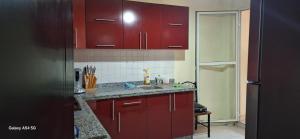 Η κουζίνα ή μικρή κουζίνα στο Fes Magic Apartment - With Swimming pool +2 φωτογραφίες