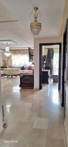 Ένα ή περισσότερα κρεβάτια σε δωμάτιο στο Fes Magic Apartment - With Swimming pool