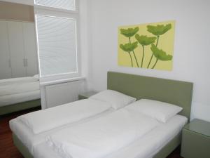 Posteľ alebo postele v izbe v ubytovaní Pension Pharmador