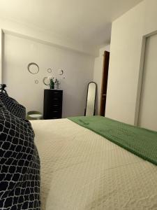 Łóżko lub łóżka w pokoju w obiekcie Chianciano Lettings