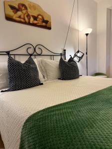 Łóżko lub łóżka w pokoju w obiekcie Chianciano Lettings