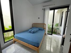 Postel nebo postele na pokoji v ubytování Matari House