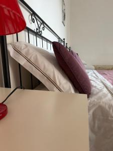 Łóżko lub łóżka w pokoju w obiekcie Chianciano Lettings