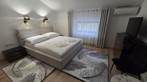 Łóżko lub łóżka w pokoju w obiekcie Motel Za Miedzą