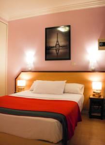 Postel nebo postele na pokoji v ubytování Hotel Audran