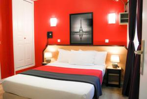 Postel nebo postele na pokoji v ubytování Hotel Audran