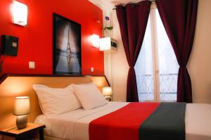 Postel nebo postele na pokoji v ubytování Hotel Audran