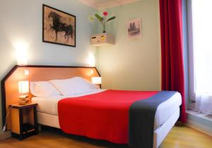 Postel nebo postele na pokoji v ubytování Hotel Audran