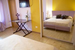Postel nebo postele na pokoji v ubytování B&B Silvia + 15 fotografií