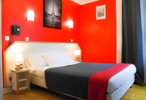 Postel nebo postele na pokoji v ubytování Hotel Audran