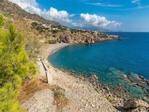 a view of a beach on a hill with the ocean at Villa Neli II in Achlia