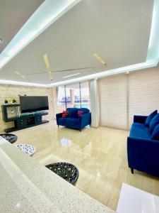 Μια τηλεόραση ή/και κέντρο ψυχαγωγίας στο Beautiful equipped family home