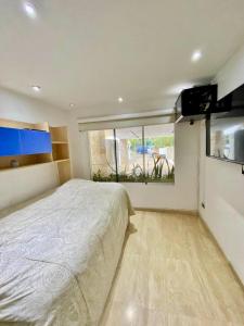 Ένα ή περισσότερα κρεβάτια σε δωμάτιο στο Beautiful equipped family home +7 φωτογραφίες