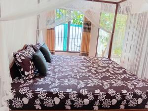 Ліжко або ліжка в номері Bakery Family Guest House