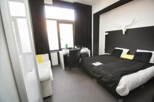 Letto o letti in una camera di Hotel Moon