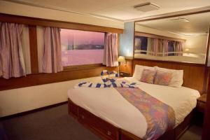 Voodi või voodid majutusasutuse Nile View Aton Cruise toas