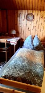 A bed or beds in a room at Platzerhütte