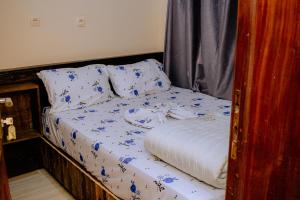 Postel nebo postele na pokoji v ubytování Empire Motel