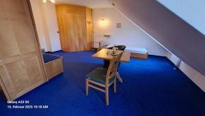 Posezení v ubytování Hotel zu den Linden