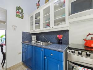 A kitchen or kitchenette at Chrisanns Paradise Suite by the Ocean - Apt#9
