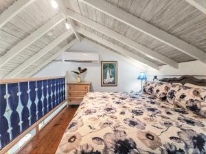 A bed or beds in a room at Chrisanns Paradise Suite by the Ocean - Apt#9