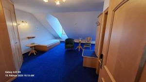 Posezení v ubytování Hotel zu den Linden