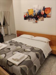 A bed or beds in a room at Il Cortile