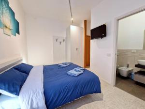 Voodi või voodid majutusasutuse Iris B&B Verona toas