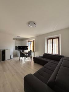 a living room with a couch and a table at Relax home in Ciciano