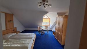 Postel nebo postele na pokoji v ubytování Hotel zu den Linden